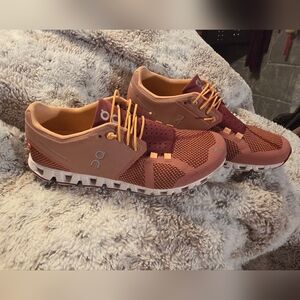 OnCloud Running Shoes in Peach and Pinkish.